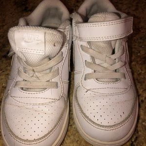 Nike’s. Worn a handful of times for cheering.